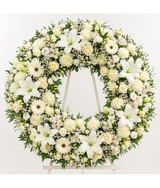 Corona completa de flores variadas · aro de 80 cm